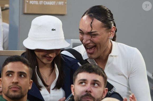 Lénie, Djebril (candidats Star Academy 2024) - Célébrités dans les tribunes des Internationaux de France de tennis de Roland Garros 2024 à Paris le 27 mai 2024. © Moreau-Jacovides/Bestimage