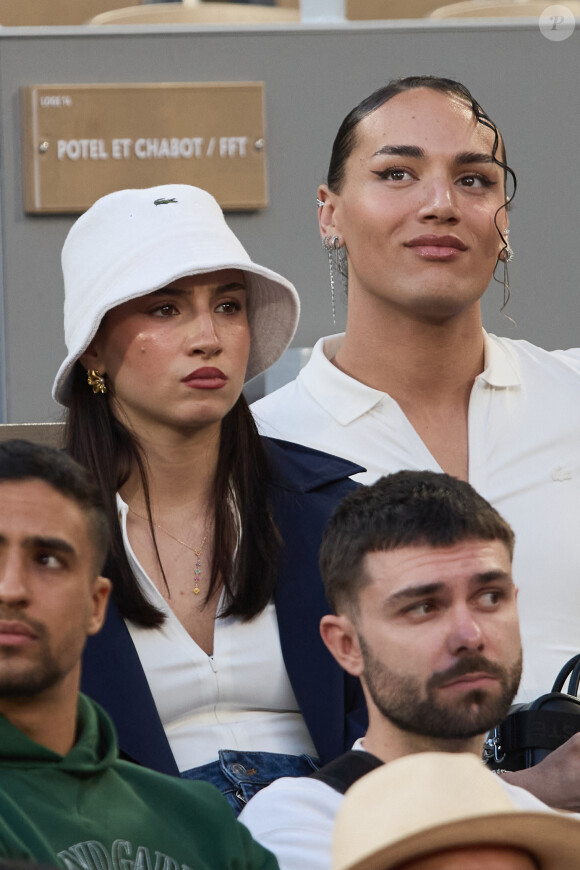 Lénie, Djebril (candidats Star Academy 2024) - Célébrités dans les tribunes des Internationaux de France de tennis de Roland Garros 2024 à Paris le 27 mai 2024. © Moreau-Jacovides/Bestimage