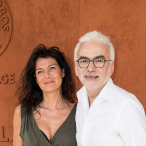 Pascal Praud et sa compagne Catherine au village lors des internationaux de tennis de Roland Garros à Paris, France, le 1 juin 2019. © Jacovides-Moreau/Bestimage 