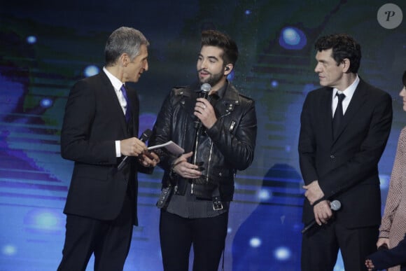 Nagui, Kendji Girac et Marc Lavoine assistent au prime de la 29e édition du Téléthon à l'Hippodrome de Longchamp à Paris le 5 décembre 2015. Jérôme Domine/ ABACAPRESS.COM