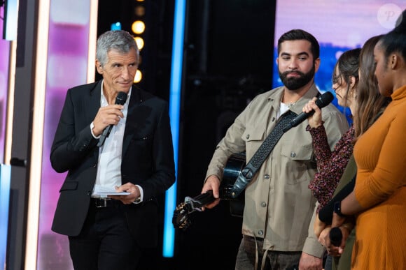 Nagui et Kendji Girac lors du Téléthon 2023, à Saint Denis, près de Paris, le 9 décembre 2023. Alexis Jumeau/ABACAPRESS.COM