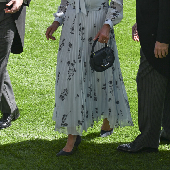 Le prince William, prince de Galles, et ses beaux-parents, Michael et Carole Middleton assistent au deuxième jour des courses hippiques à Ascot, le 19 juin 2024. 