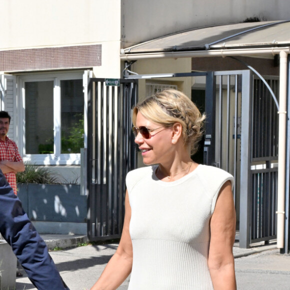 Christian Estrosi, le maire Horizon de Nice, et sa femme Laura Tenoudji Estrosi ont voté pour le 2eme tour des élections législatives au bureau Port Lympia à Nice, le 7 juillet 2024. © Bruno Bebert / Bestimage