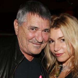 Jean-Marie Bigard et sa femme Lola Marois lors du cocktail de bienfaisance 'Octobre Rose' au restaurant Fidèle à Paris, France, le 16 octobre 2017