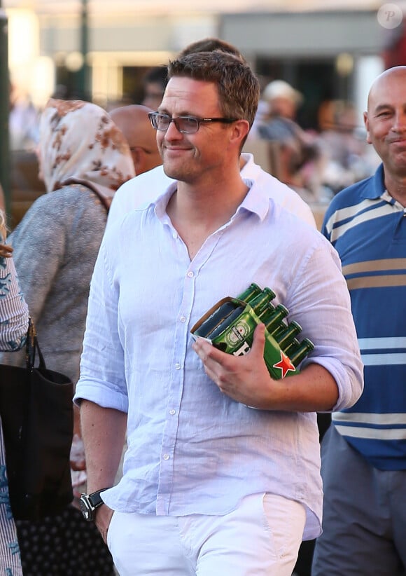 Exclusif - Web avec prix minimun - Ralf Schumacher profite de ses vacances à Saint-Tropez avec sa famille et ses amis, le 21 août 2014. Ils sont d'abord allés faire une dégustation de vin puis se sont promenés dans la ville avant de se rendre au Nikki Beach sur la plage de Pampelonne.