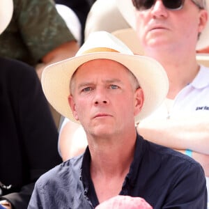 Julien Arnaud en tribunes lors des Internationaux de France de tennis de Roland Garros 2023, à Paris, France, le 9 juin 2023.