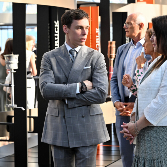 Louis Ducruet, Mélanie de Massy - Le prince Albert II et la princesse Charlène de Monaco ont inauguré l'exposition "La Flamme Olympique au fil du temps" qui présente la collection de torches olympiques du prince Souverain, sous la verrière du Grimaldi Forum à Monaco, le 18 juillet 2024.© Bruno Bebert/Bestimage