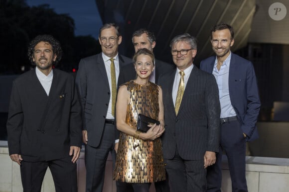 Nicolas Bazire, Jean-Charles Tréhan, Pierre-Emmanuel Angeloglou - Photocall du dîner "Prelude pour les JO" à la Fondation Vuitton à Paris, France, le 25 juillet 2024. © Olivier Borde/Bestimage 