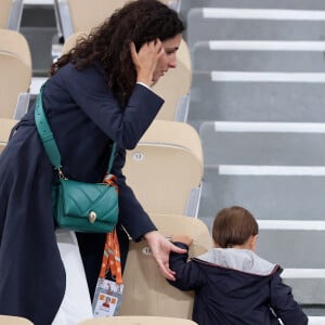 Xisca Perello (femme de Rafael Nadal) et son fils Rafael Junior - La famille de Rafael Nadal (Rafa) dans les tribunes pour le premier tour des Internationaux de France de tennis de Roland Garros 2024 opposant Rafael Nadal (Rafa) à Alexander Zverev, à Paris, France, le 27 mai 2024. © Jacovides-Moreau/Bestimage