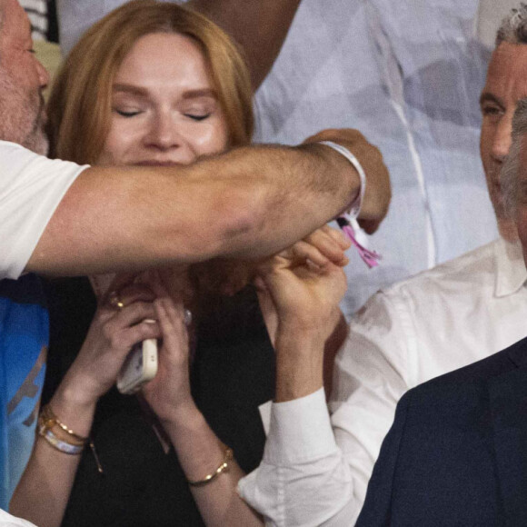 Emmanuel Macron, David Douillet - Célébrités assistent à la victoire de Teddy Riner sacré champion Olympique aux épreuves de judo +100KG lors des Jeux Olympiques de Paris 2024 (JO) au Arena Champs de Mars à Paris le 2 aout 2024. © Perusseau-Jacovides/Bestimage 