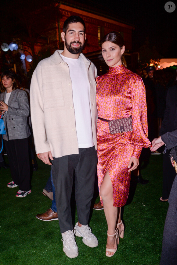 Exclusif - Nikola Karabatic et sa compagne Géraldine Pillet - Les people dans l'espace Experience Immersive réservé aux VIP lors du Etam Live Show 2019 au Stade Roland Garros lors de la fashion week à Paris, le 24 septembre 2019. © Rachid Bellak/Bestimage