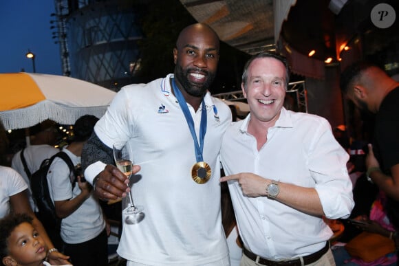 Ce jour-là, de nombreuses personnalités sont venues féliciter Teddy Riner
Exclusif - Teddy Riner et Stéphane Rotenberg - Teddy Riner fête son titre de champion Olympique de judo +100KG au restaurant "Podium" du groupe (Les bistrots Pas Parisiens) à Paris le 2 aout 2024. © Rachid Bellak/Bestimage