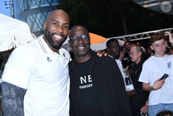 Exclusif - Teddy Riner et Lilian Thuram - Teddy Riner fête son titre de champion Olympique de judo +100KG au restaurant "Podium" du groupe (Les bistrots Pas Parisiens) à Paris le 2 aout 2024. © Rachid Bellak/Bestimage