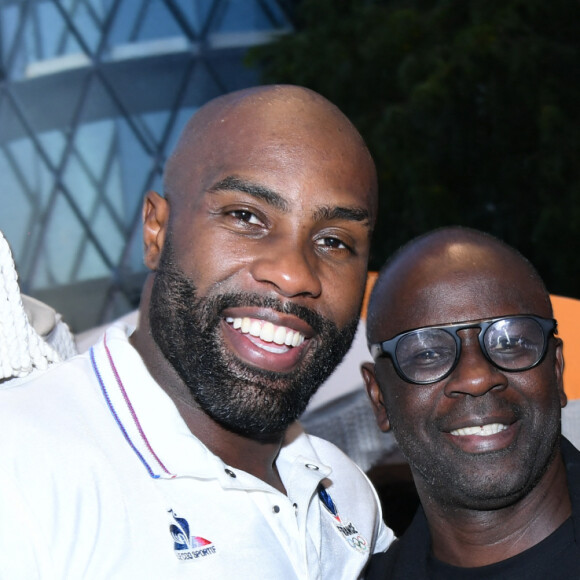 Exclusif - Teddy Riner et Lilian Thuram - Teddy Riner fête son titre de champion Olympique de judo +100KG au restaurant "Podium" du groupe (Les bistrots Pas Parisiens) à Paris le 2 aout 2024. © Rachid Bellak/Bestimage