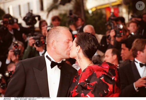 Bruce Willis et Demi Moore lors du 50ème Festival du film international de Cannes en 1997