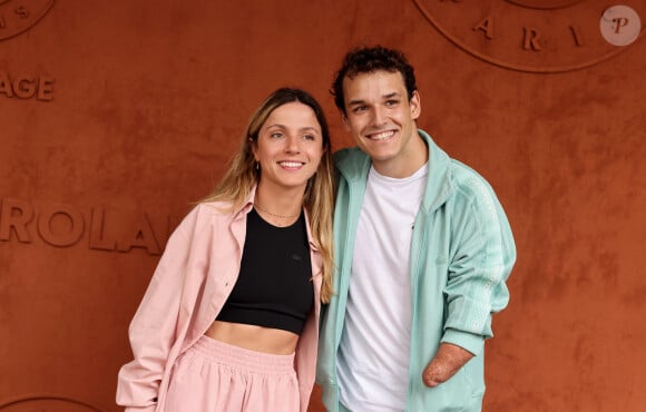 Théo Curin et sa compagne Marie-Camille Fabas au village lors des Internationaux de France de tennis de Roland Garros 2023, à Paris, France, le 11 juin 2023. © Jacovides-Moreau/Bestimage 