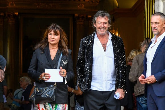 Jean-Luc Reichmann et sa femme Nathalie Lecoultre - Mariage d'Hugues Aufray et de Murielle Mégevand à l'église Saint-Vigor de Marly-Le Roy, France, le 2 septembre 2023. 