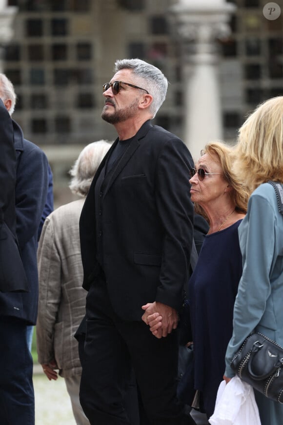 Olivier Minne arrive aux funérailles de Patrice Laffont à Paris vendredi 23 août.