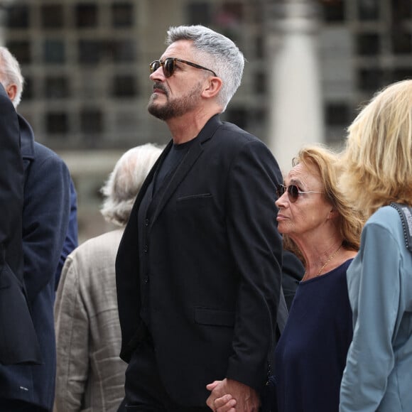 Olivier Minne arrive aux funérailles de Patrice Laffont à Paris vendredi 23 août.