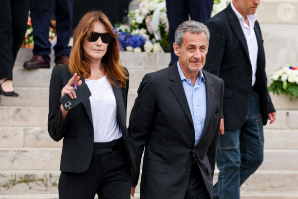 Nicolas Sarkozy et sa femme Carla Bruni - Sortie des obsèques de l'auteure-compositrice-interprète et actrice française Françoise Hardy au crématorium du cimetière du Père-Lachaise à Paris, France, le 20 juin 2024. © Jacovides-Moreau/Bestimage