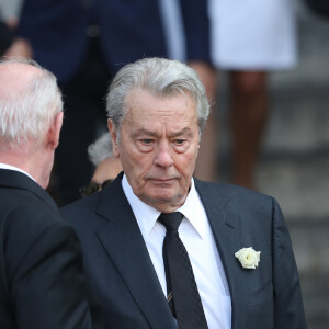 Pascal Desprez et Alain Delon - Sorties des obsèques de Mireille Darc en l'église Saint-Sulpice à Paris. Le 1er septembre 2017  Funerals of the french actress Mireille Darc in Paris. On september 1st 2017