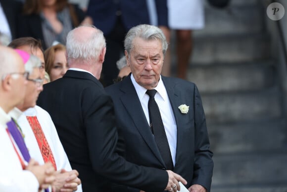 Pascal Desprez et Alain Delon - Sorties des obsèques de Mireille Darc en l'église Saint-Sulpice à Paris. Le 1er septembre 2017  Funerals of the french actress Mireille Darc in Paris. On september 1st 2017