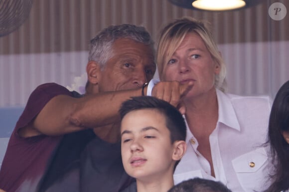 Naguy et Anne-Élisabeth Lemoine - Célébrités en tribunes des Internationaux de France de tennis de Roland Garros 2023 à Paris. © Jacovides-Moreau/Bestimage 