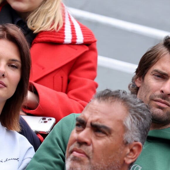 Camille Lacourt et sa compagne Alice Detollenaere dans les tribunes des Internationaux de France de tennis de Roland Garros 2024 à Paris, France, le 2 juin 2024. © Jacovides-Moreau/Bestimage 