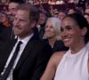 Le prince Harry ne semble pas regretter le moins du monde son ancienne vie en Angleterre. Bien au contraire !
Le prince Harry, duc de Sussex et Meghan Markle, duchesse de Sussex, lors de la cérémonie des "ESPY Awards" à Los Angeles.