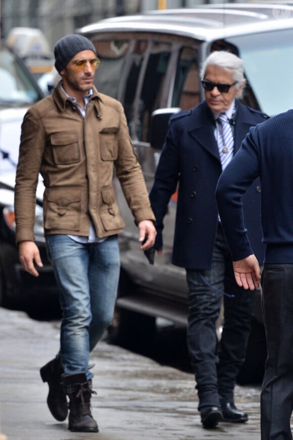 Ainsi que Sébastien Jondeau. Tous ont décidé d'acquitter les pénalités dues au fisc...
Le mannequin Sebastien Jondeau et le créateur Karl Lagerfeld sont vus à la sortie de l'hôtel Mercer à Soho à New York City, NY, USA. Photo par Morgan Dessalles/ABACAPRESS.COM