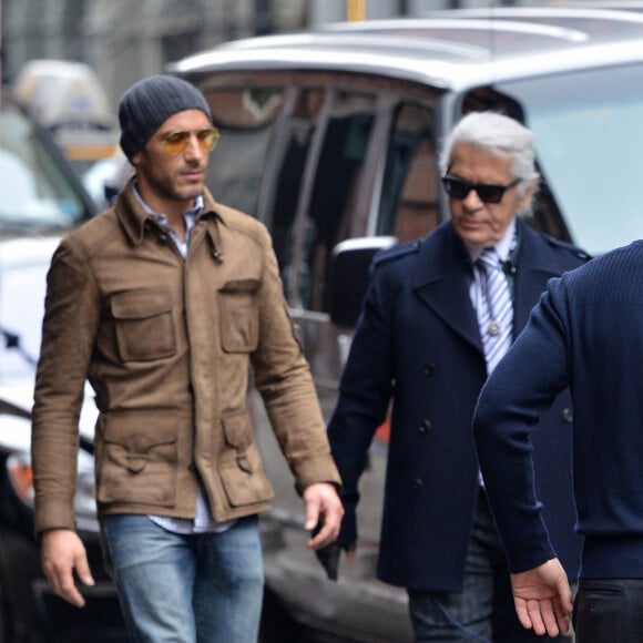 Ainsi que Sébastien Jondeau. Tous ont décidé d'acquitter les pénalités dues au fisc...
Le mannequin Sebastien Jondeau et le créateur Karl Lagerfeld sont vus à la sortie de l'hôtel Mercer à Soho à New York City, NY, USA. Photo par Morgan Dessalles/ABACAPRESS.COM