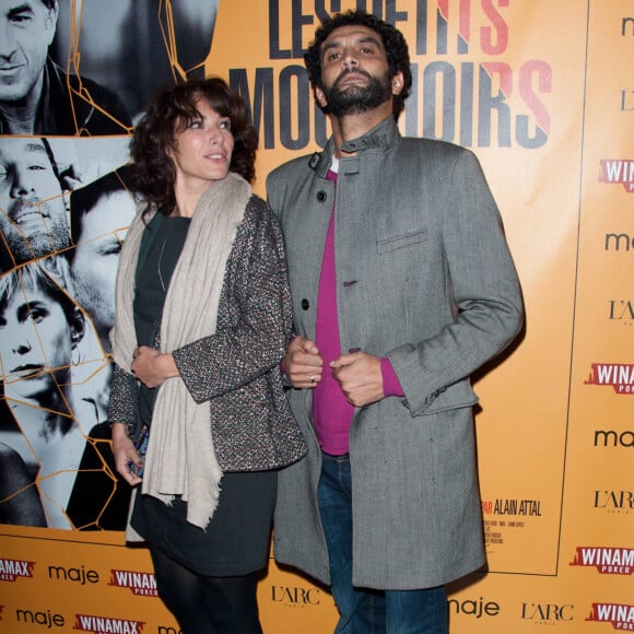 Anne Depetrini et Ramzy Bedia arrivent à la soirée 'Les Petits Mouchoirs' organisée au club 'L'Arc', après l'avant-première française à Paris, France, le 14 octobre 2010.