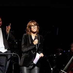 Exclusif - Candice Mahout - Scène - Spectacle symphonique Claude Lelouch "D'un film à l'autre" au Palais des Congrès de Paris le 14 novembre 2022. Pour Fêter ses 85 ans et 60 de carrière, Claude Lelouch a créé un ciné-concert, "Claude Lelouch - D'un film à l'autre", dans lequel la musique de ses films est jouée par l'orchestre philharmonique de Prague, au Palais des Congrès à Paris. Sur le gâteau, son chiffre fétiche : 13 car 85 ans (8+5 = 13). Claude Lelouch associe le 13 à toute sa vie professionnelle : sa société “Les films 13” et son cinéma, le “Club 13. © Moreau / Rindoff / Bestimage  Exclusive - No web en Suisse / Belgique Claude Lelouch symphonic show "D'un film à l'autre" at the Palais des Congrès in Paris on 14 November 2022. To celebrate his 85th birthday and 60 years of career, Claude Lelouch has created a cine-concert, "Claude Lelouch - D'un film à l'autre", in which the music of his films is played by the Prague Philharmonic Orchestra, at the Palais des Congrès in Paris. On the cake, his favourite number: 13 because he is 85 years old (8+5 = 13). Claude Lelouch associates 13 with his entire professional life: his company "Les films 13" and his cinema, the "Club 13. 