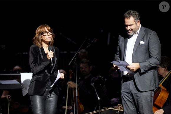 Exclusif - Bruce Toussaint et Candice Mahout - Scène - Spectacle symphonique Claude Lelouch "D'un film à l'autre" au Palais des Congrès de Paris le 14 novembre 2022. Pour Fêter ses 85 ans et 60 de carrière, Claude Lelouch a créé un ciné-concert, "Claude Lelouch - D'un film à l'autre", dans lequel la musique de ses films est jouée par l'orchestre philharmonique de Prague, au Palais des Congrès à Paris. Sur le gâteau, son chiffre fétiche : 13 car 85 ans (8+5 = 13). Claude Lelouch associe le 13 à toute sa vie professionnelle : sa société “Les films 13” et son cinéma, le “Club 13. © Moreau / Rindoff / Bestimage  Exclusive - No web en Suisse / Belgique Claude Lelouch symphonic show "D'un film à l'autre" at the Palais des Congrès in Paris on 14 November 2022. To celebrate his 85th birthday and 60 years of career, Claude Lelouch has created a cine-concert, "Claude Lelouch - D'un film à l'autre", in which the music of his films is played by the Prague Philharmonic Orchestra, at the Palais des Congrès in Paris. On the cake, his favourite number: 13 because he is 85 years old (8+5 = 13). Claude Lelouch associates 13 with his entire professional life: his company "Les films 13" and his cinema, the "Club 13. 