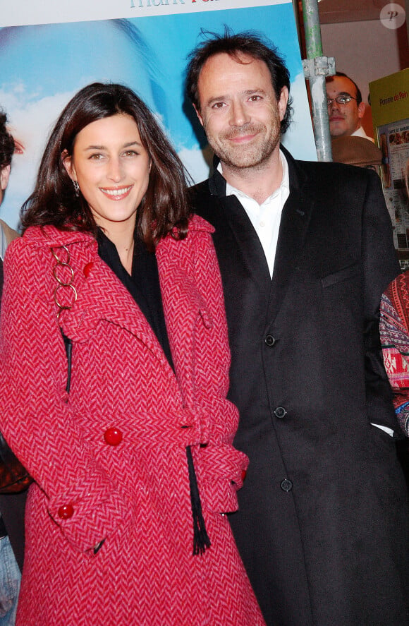 L'écrivain et scénariste français Marc Levy et sa compagne Pauline Leveque assistent à l'avant-première française du film 'Et si c'était Vrai' au Gaumont Ambassade sur les Champs-Elysées à Paris le 22 novembre 2005. Photo par Bruno Klein/ABACAPRESS.COM.