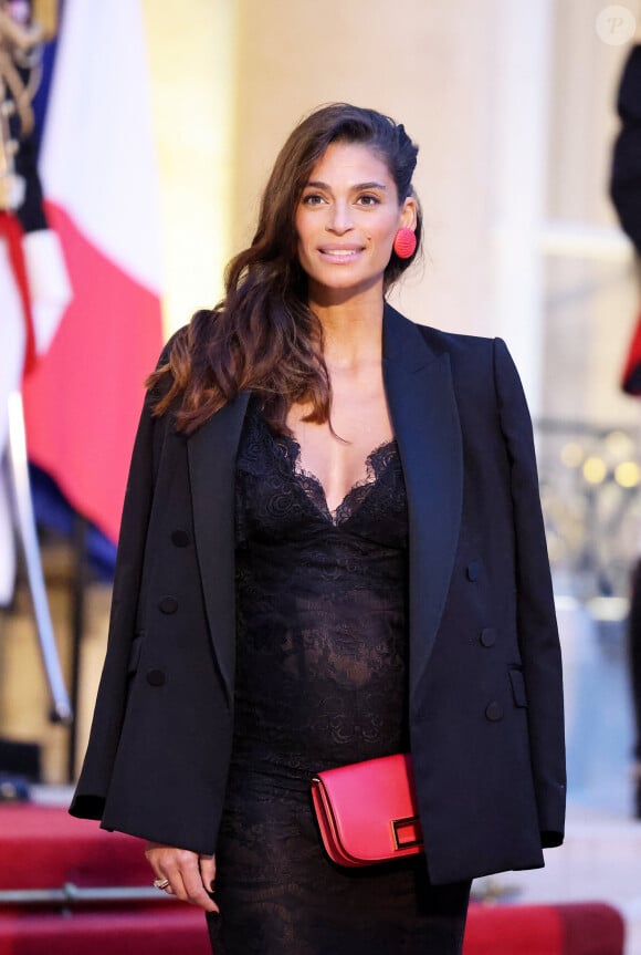 Tatiana Silva (enceinte, ancienne miss Belgique) arrivant au dîner d'état au palais de l'Elysée à Paris en l'honneur de la visite du roi et de la reine de Belgique en France le 14 octobre 2024. © Dominique Jacovides / Bestimage 