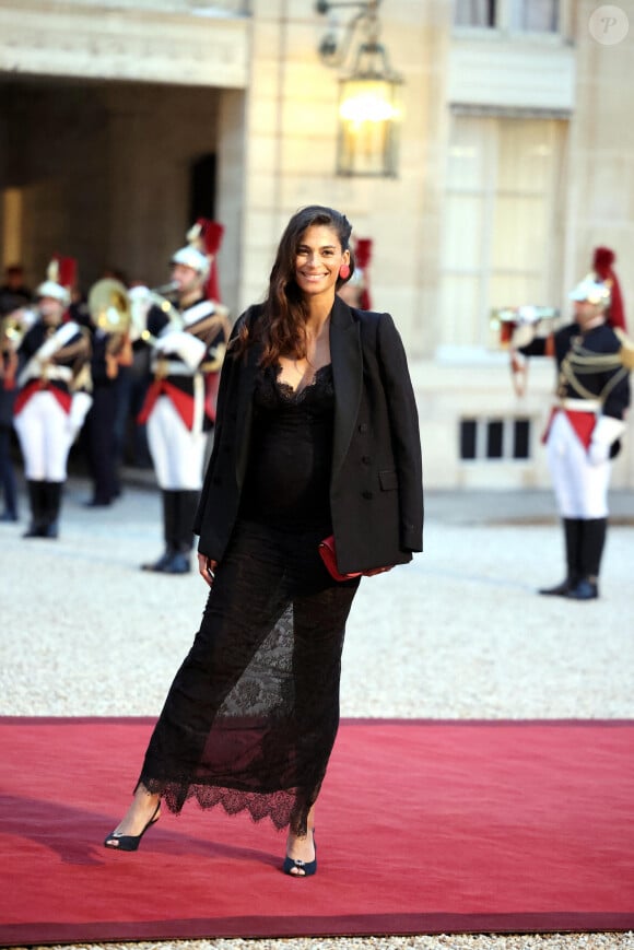 Tatiana Silva (enceinte, ancienne miss Belgique) arrivant au dîner d'état au palais de l'Elysée à Paris en l'honneur de la visite du roi et de la reine de Belgique en France le 14 octobre 2024. © Dominique Jacovides / Bestimage 