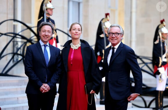 Stéphane Bern, Adelaïde de Clermont-Tonnerre et le designer Edouard Vermeulen arrivant au dîner d'état au palais de l'Elysée à Paris en l'honneur de la visite du roi et de la reine de Belgique en France le 14 octobre 2024. © Dominique Jacovides / Bestimage 