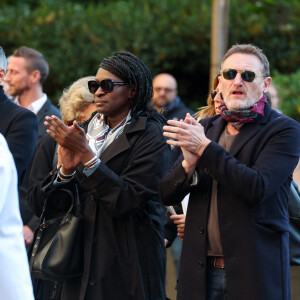 Ramatoulaye Diop, la compagne du défunt, Jean-Paul Rouve - Sortie des Obsèques de Michel Blanc en l'église Saint-Eustache à Paris, le 10 octobre 2024. © Moreau / Jacovides / Bestimage 