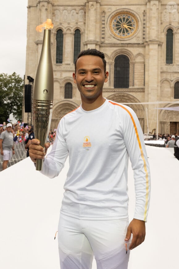 Mohamed Bouhafsi - Les célébrités participent aux étapes finales du relais de la Flamme Olympique à Saint-Denis (JO), le 26 juillet 2024. © Jeremy Melloul - Jack Tribeca /Bestimage 