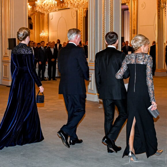 Le président Emmanuel Macron, Brigitte Macron, le roi Philippe et la reine Mathilde de Belgique lors du dîner d'état au palais de l'Elysée à Paris en l'honneur du couple royal de Belgique, en visite d'état à Paris le 14 octobre 2024. © Frédéric Andrieu / Bestimage 