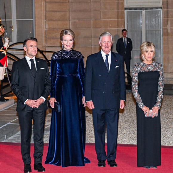 Le président Emmanuel Macron, Brigitte Macron, Le roi Philippe de Belgique, La reine Mathilde de Belgique lors du dîner d'état au palais de l'Elysée à Paris en l'honneur du couple royal de Belgique, en visite d'état à Paris le 14 octobre 2024. © Frédéric Andrieu / Bestimage 