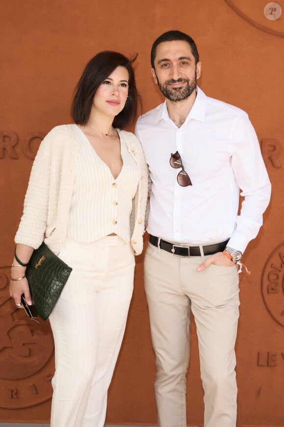 Jimmy Mohamed et sa femme Souailla au village lors des Internationaux de France de tennis de Roland Garros 2024, à Paris, France, le 26 mai 2024. © Jacovides-Moreau/Bestimage