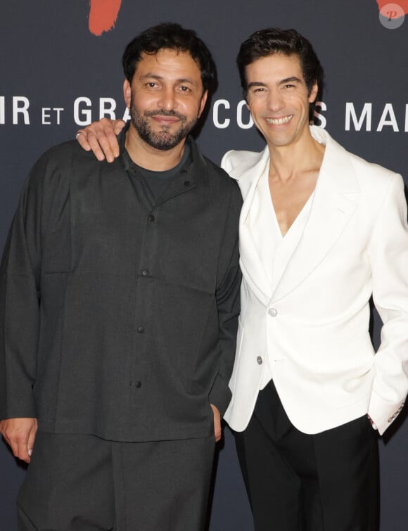 Jean-Rachid Kallouche (producteur) et Tahar Rahim lors de l'avant-première du film "Monsieur Aznavour" au cinéma Le Grand Rex à Paris le 22 octobre 2024. © Coadic Guirec / Bestimage