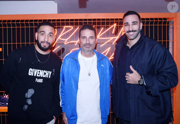 Semi-Exclusif - Guest, Richard Orlinski, Adil Rami - Lancement de la collaboration artistique Puma x Richard Orlinski à Paris. Le 24 octobre 2024 © Rachid Bellak / Bestimage  