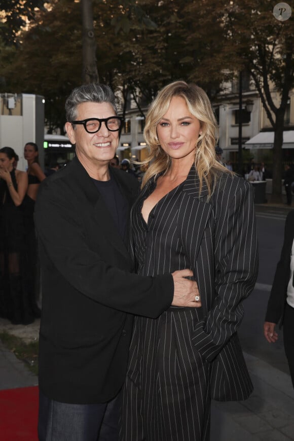 Marc Lavoine et sa compagne Adriana Karembeu arrivant au "Concerto pour la Paix" organisé par Omar Harfouch au Théâtre des Champs Élysées à Paris, France, le 18 Septembre 2024. © Perusseau / Tribeca / Bestimage