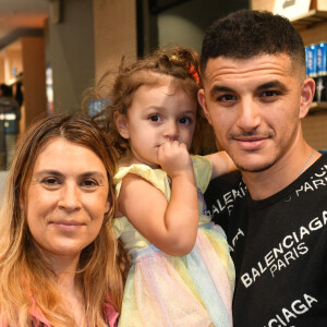 Marion Bartoli, son compagnon Yahya Boumediene et leur fille Kamilya - Lancement de la collection Mouratoglou au magasin Celio Ternes à Paris le 25 mai 2023. © Veeren/Bestimage