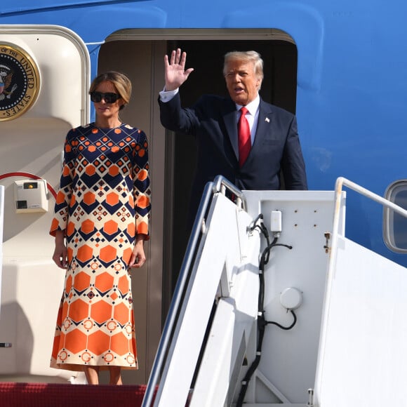 Donald Trump et sa femme Melania à leur arrivée, à bord de Air Force One, à l'aéroport international de Palm Beach. Le 20 janvier 2021 