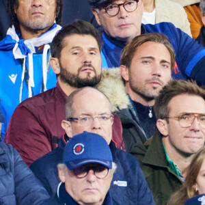 Christophe Beaugrand et son mari Ghislain Gerin - People des les tribunes de la coupe du Monde de Rugby France 2023 - Match de quart de finale "France-Afrique du Sud (28-29)" au Stade de France à Saint-Denis 15 octobre 2023. © Moreau-Jacovides/Bestimage 