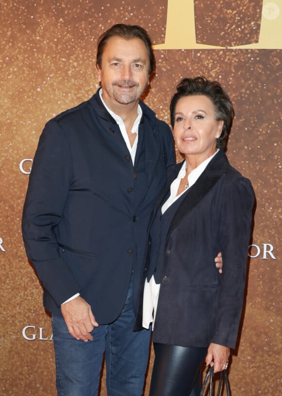 Henri Leconte et sa compagne Maria Dowlatshahi - Avant-première du film "Gladiator 2" au cinéma Pathé Palace à Paris le 10 novembre 2024. © Coadic Guirec / Bestimage 